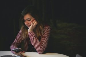 Woman problematic using her phone