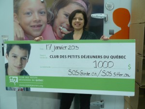 Paulina Podgorska, Fondatrice de SOSgarde, avec le cheque de la donation